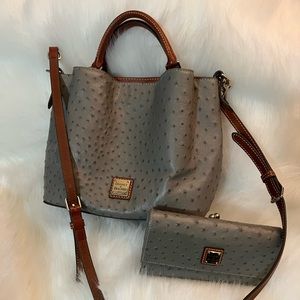 Gray Dooney and Bourke pebble leather bucket purse and matching wallet.